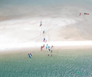Travelers kayaking on an island in southern Thailand